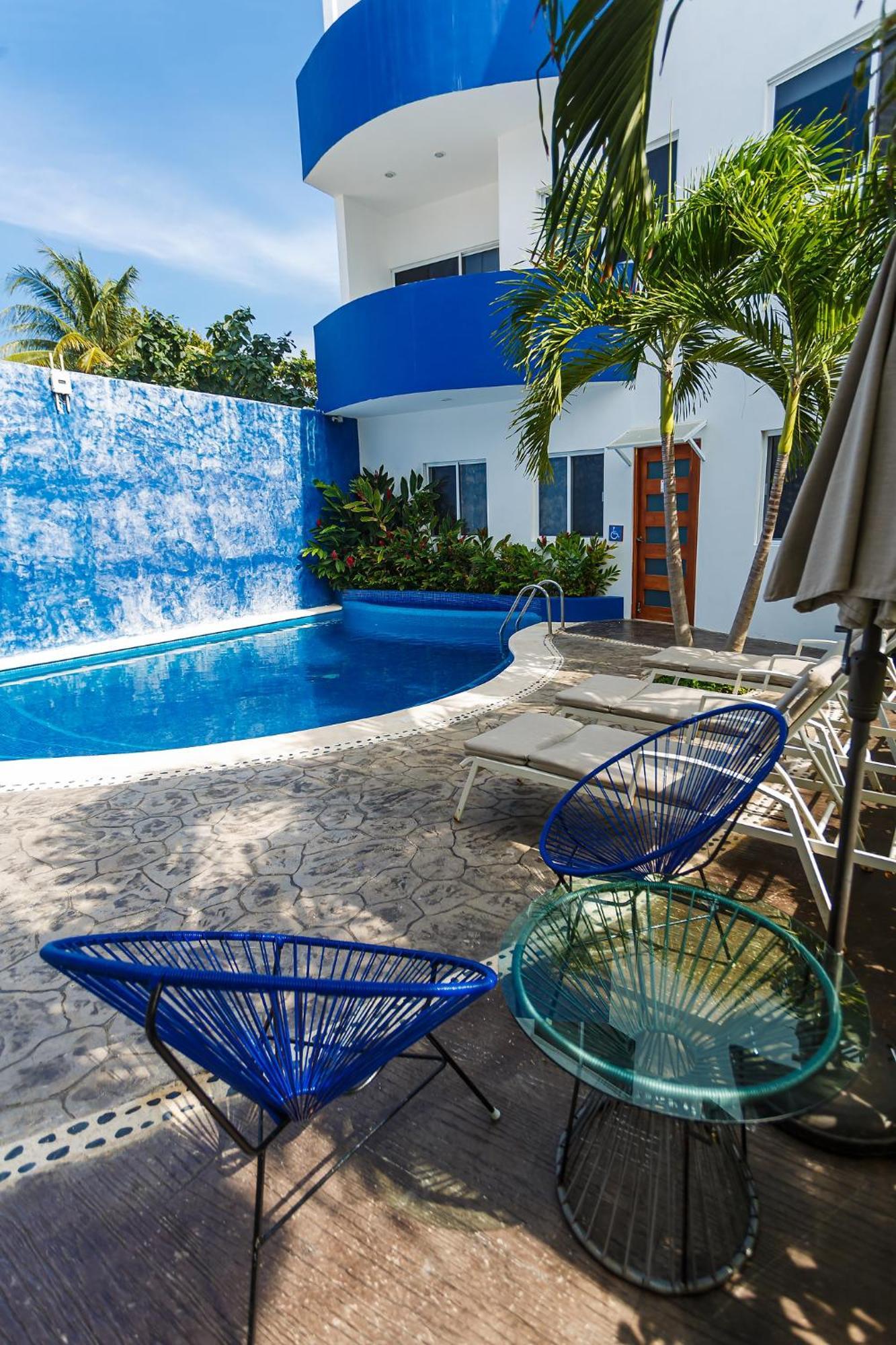 Kaam Accommodations ปัวร์โตโมเรลอส ภายนอก รูปภาพ