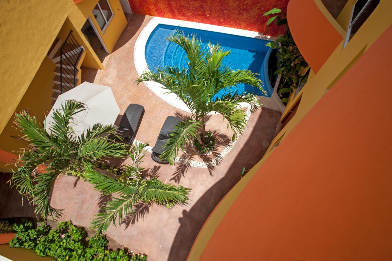Kaam Accommodations ปัวร์โตโมเรลอส ภายนอก รูปภาพ